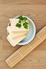 Sliced Tofu on a wooden background