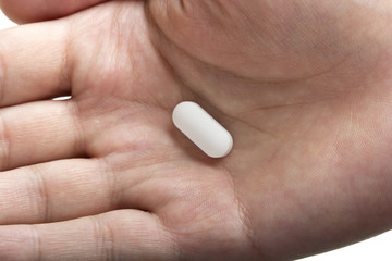 Hand with pill