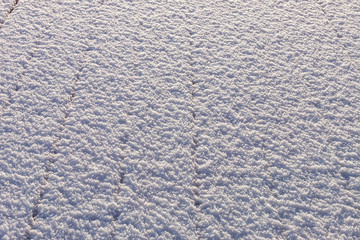 Snow covered wood terrace floor