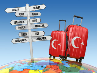 Fototapeta premium Travel concept. Suitcases and signpost what to visit in Turkey.