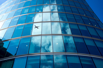 A jet airplane silhouette with business office 