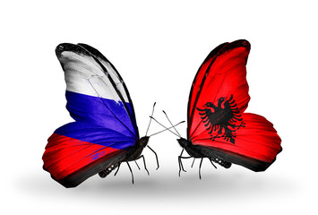 Two butterflies with flags Russia and Albania