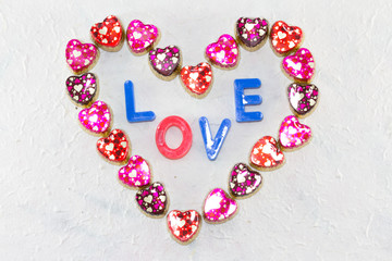 Heart shape of colorful heart patterns with plastic magnet word