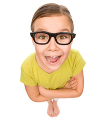 Portrait of a happy little girl wearing glasses