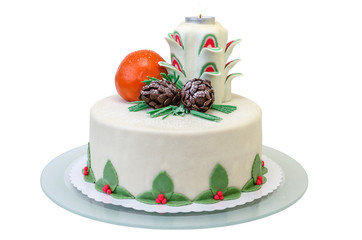 birthday cake with a candle, orange and two fir-cones isolated