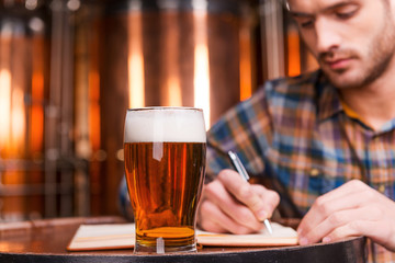 Planning his beer business.