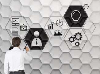businessman drawing group of icons