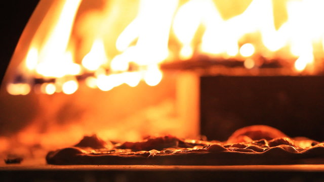 Pizza in a wood fire oven