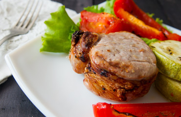 roasted pork steak with grilled vegetables