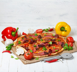 Hot baked pizza with different ingredients