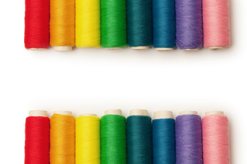 rainbow colored threads set isolated over white background