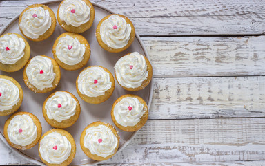 Cupcakes  on a wooden white background