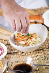 Cloose up hand of Chef cooking Noodle