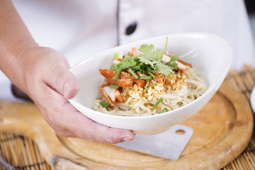 Chef present egg Noodle with roast chicken