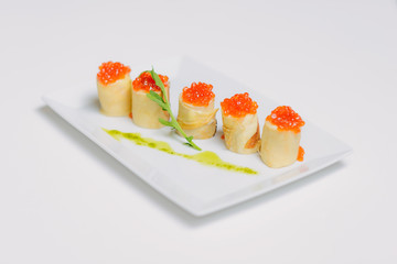 Crepes with salmon caviar and cheese