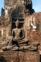 Fototapeta premium Ancient Buddha in Phra Phang Sam Yod temple,Thailand.
