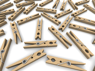 Прищепки бельевые на светлом фоне