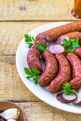 plate full various species sausages