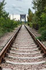 Fototapeta na wymiar railway track near Chernobyl Zone of Alienation, Ukraine