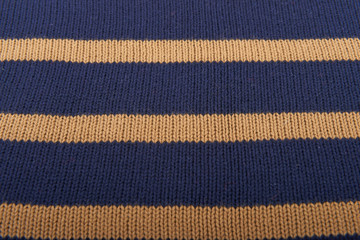 Fototapeta na wymiar Texture of knitted wool cotton striped fabric.