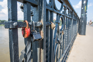 love padlocks on a bridge in Warsaw, Poland