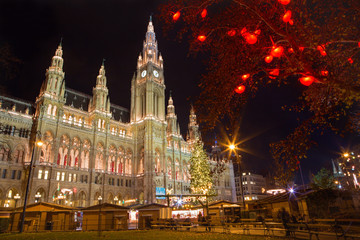 Fototapeta na wymiar Vienna - tower of town-hall and christmas decoration