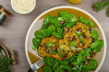 Rabbit steaks with herbs and sour cream