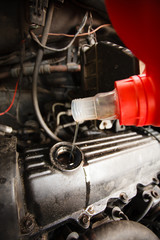 Fototapeta premium Motor oil, car engine close up