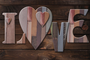 wooden letters love with hearts