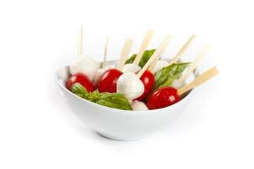 Caprese sticks on white background. Selective focus.
