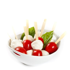 Caprese sticks on white background. Selective focus.