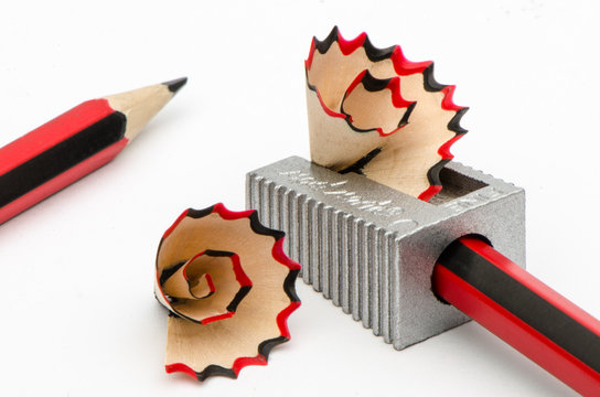 Lead pencil with sharpner on white background