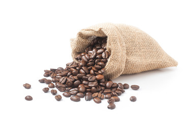 Coffee beans pouring out from the burlap sack