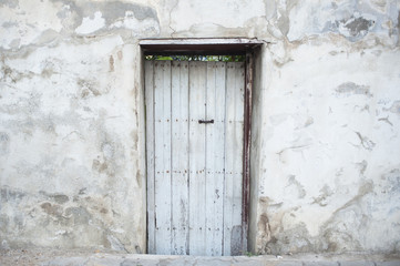 Old door on old wall
