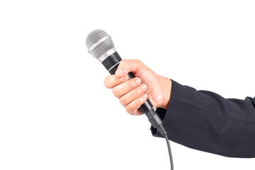 Business man holding a microphone isolated on white background