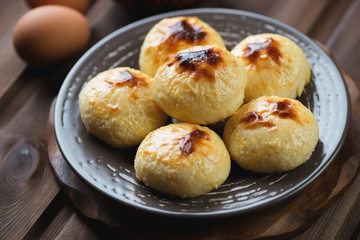 Close-up of russian traditional curd pancakes on a plate