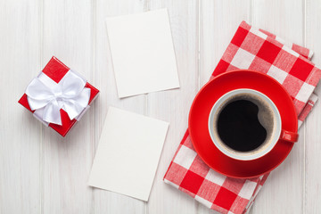 Obraz na płótnie Canvas Valentines day blank photo frames, coffee cup and gift box