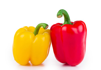 Red and yellow peppers with tails.