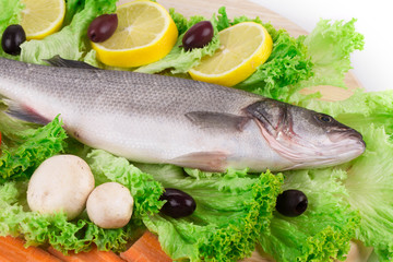 Composition of fresh seabass and vegetables.