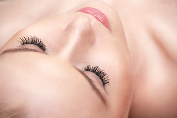 Naklejka premium Lying woman eyes with long eyelashes.