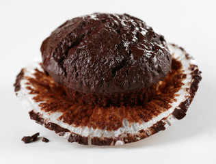 Yummy chocolate cupcake isolated on white