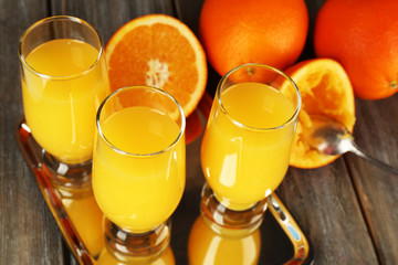 Glass of orange juice with slices