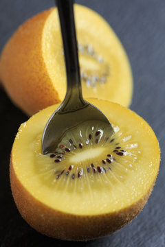 Kiwi Gold Fruit With A Spoon