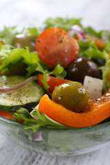 Greek salad in glass dish, closeup