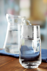 Glass of ice water with napkin
