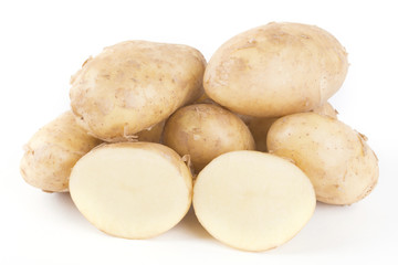 raw potatoes on white background