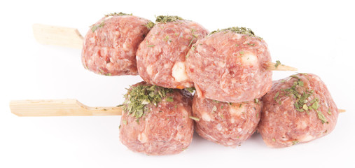 Meat ball with stick on white background