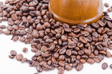 Vintage manual coffee grinder with coffee beans isolated