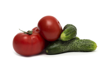 Red tomato and green cucumber. Photo.