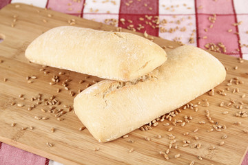 small bread on wooden board